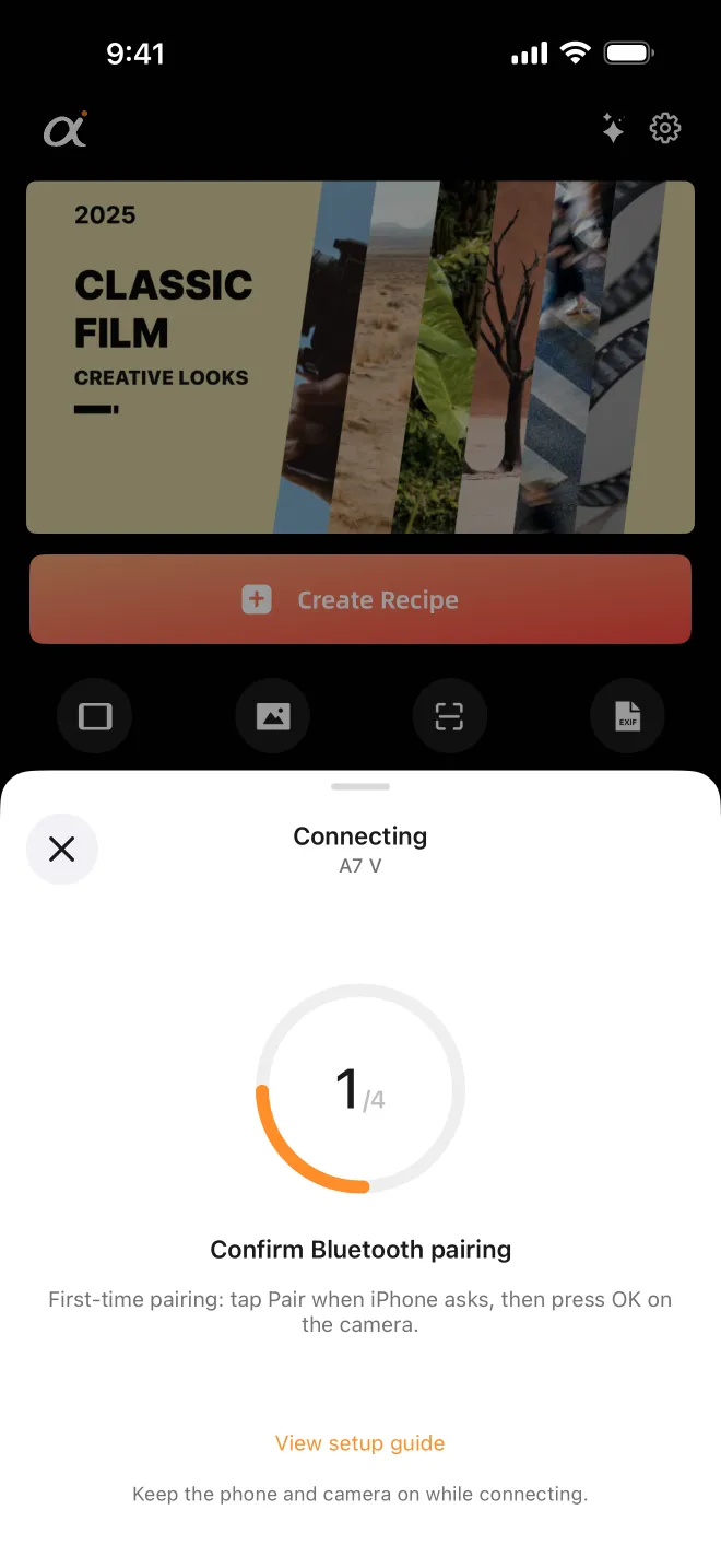 First-time pairing: tap Pair on the iPhone, then press OK on the camera.